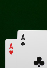two ace,s on green felt