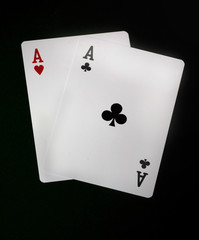 two ace,s on green felt