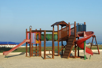Fototapeta na wymiar Playground on sea beach