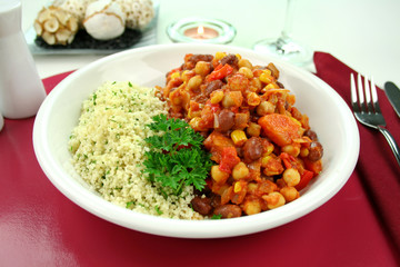 Delicious vegetable and lentil hotpot with couscous.