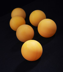 Orange spheres. For ping-pong