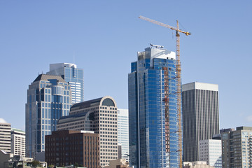 Fototapeta na wymiar New modern skyscrapers and construction crane in Seattle