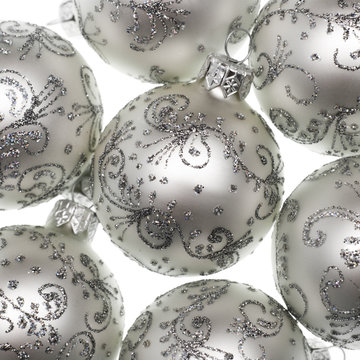 Silver Christmas Baubles On White Background