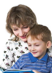 Happy son with mother read the book