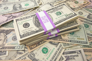 Stacks of US Money Background Contains Recent Currency Designs