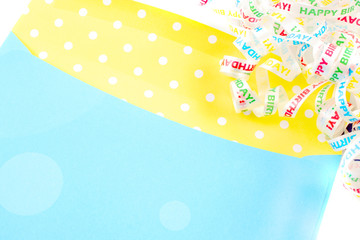 yellow and green empty birthday envelope with polka dots