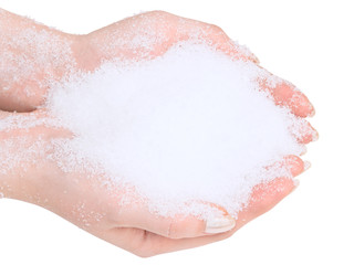 Photo of the hands with snow against the white background