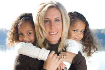 A mother and her daughters enjoying the outdoors