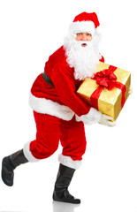Happy running Christmas Santa. Isolated over white background.