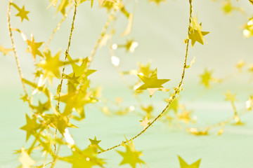 Holiday series:  Christmas decorated golden stars-shaped garland