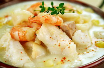 Delicious thick and creamy seafood chowder - obrazy, fototapety, plakaty