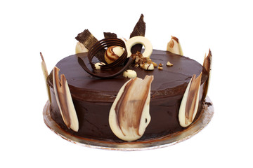 A dark chocolate cake isolated over white background..