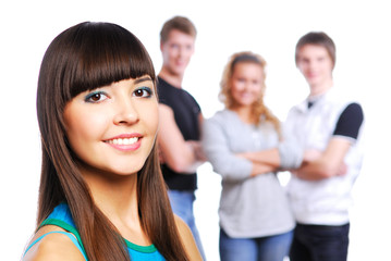 Obraz premium Portrait of a beautiful teen girl. Friends on a background.