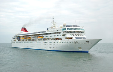 Fototapeta na wymiar Cruise ship in a sea