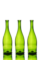 Three green wine bottles isolated on white