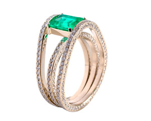 Gold a ring with brilliants and an emerald