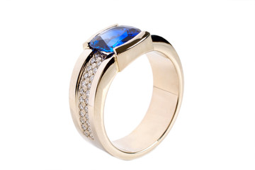 Gold ring with dark blue sapphire