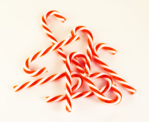 A soft image of a small pile of plastic candy canes