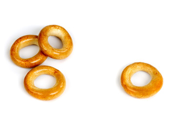 Four small dry biscuit in the shape of a doughnut