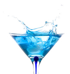 beautiful glass filled with blue water on white