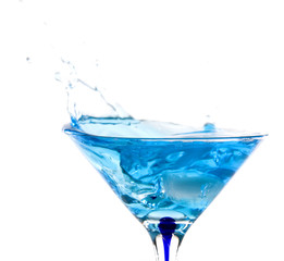 beautiful glass filled with blue water on white