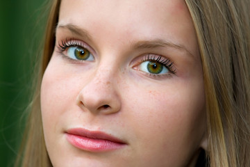 Fototapeta premium Close-up portrait of beautiful young fashion model girl
