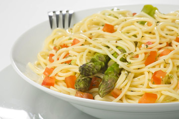 natural fresh spaghetti with tomato sauce and asparagus