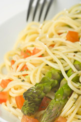 natural fresh spaghetti with tomato sauce and asparagus