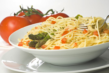 natural fresh spaghetti with tomato sauce and asparagus