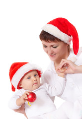 baby and mother in christmas hats