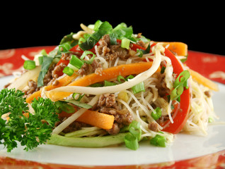 Stirfry beef chow mein with fresh Chinese vegetables.