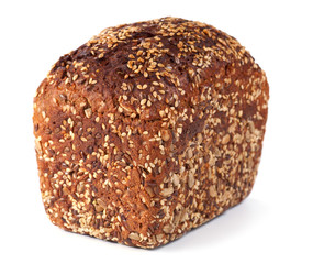 loaf of whole rye bread isolated on white background