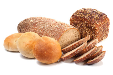 loafs of whole wheat and rye bread isolated on white background
