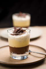 Delicious chocolate trifle with custard and chocolate curls
