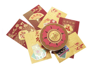 Fototapeta na wymiar Chinese New Year Cake and Red Packets