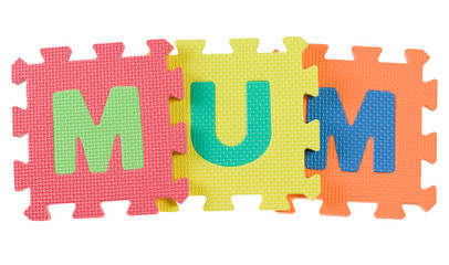 Alphabet blocks forming the word MUM isolated on white