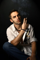 man with a cigar on a black background