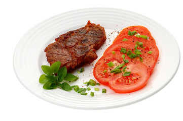 Grilled steak with vegetable salad isolated on white