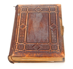 Single old leather bound book isolated on a white background