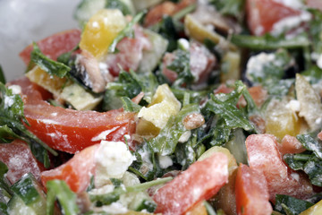 Healthy salad with vegetables and cheese