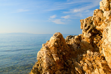 Fototapeta na wymiar rock and blue water of Adriatic sea