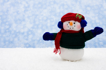 Snowman wearing scarf on snowflake background