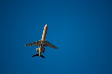 Jet airliner against blue sky