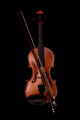 Fototapeta na wymiar Violin and bow on black