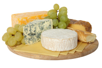 Cheese and grapes on wooden platter