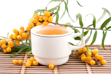 tea with sea-buckthorn isolated on a white background