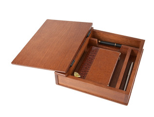 Casket with a notebook and pens