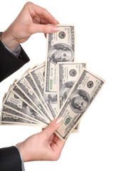 Money in female hands. Isolated.