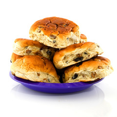 currant bread rolls on a plate