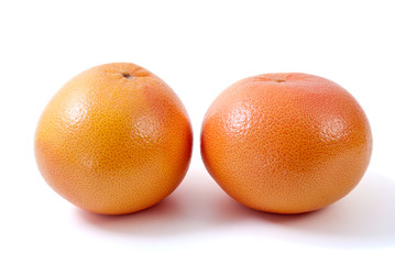 Two orange grapefruits